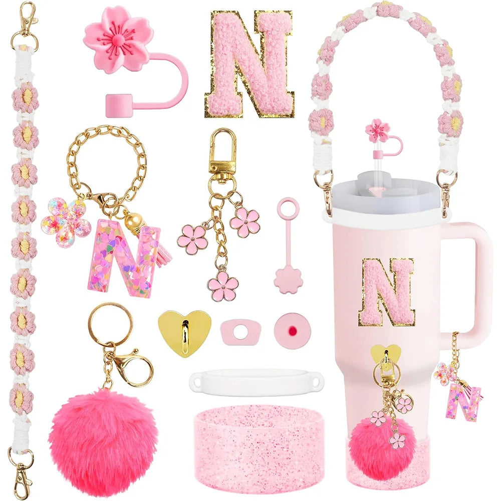 VaultHaus 11 piece Tumbler Cup Accessory Kit in pink and gold with charms, keychains, and handle strap