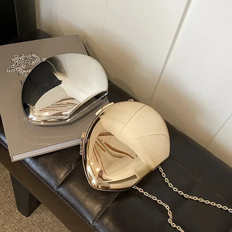 Elegant Acrylic Shell Shape Clutch Bag in Black and Gold with a Chic Design for Special Occasions