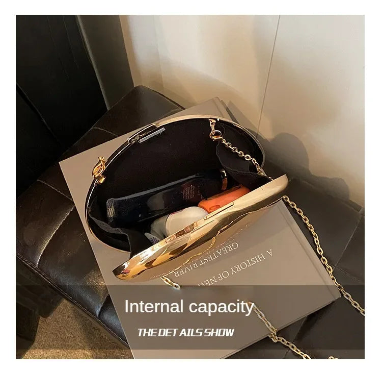 Interior view of an Acrylic Shell Shape Clutch Bag showcasing its spacious design and elegant style