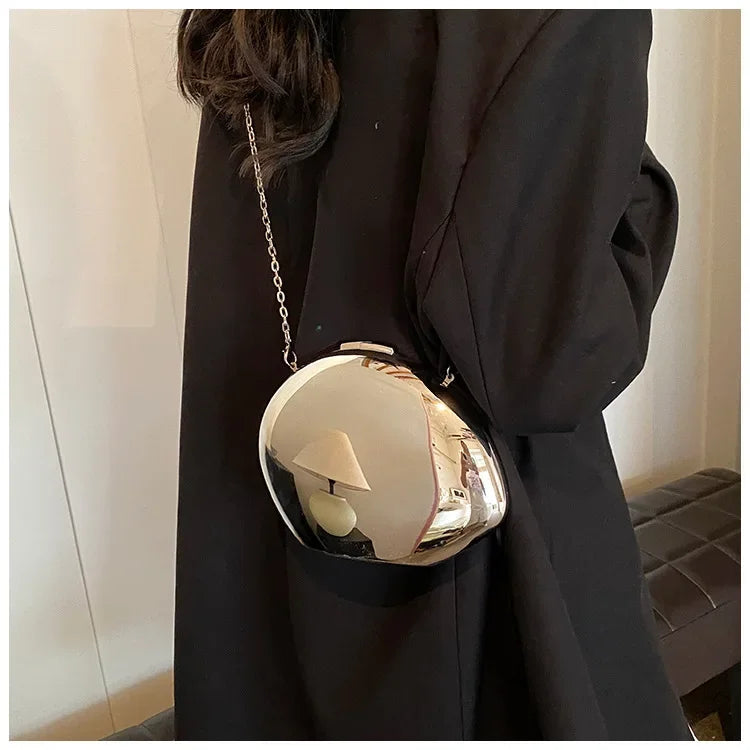 Stylish Acrylic Shell Shape Clutch Bag with a Unique Design and Chain Strap for Elegant Outings