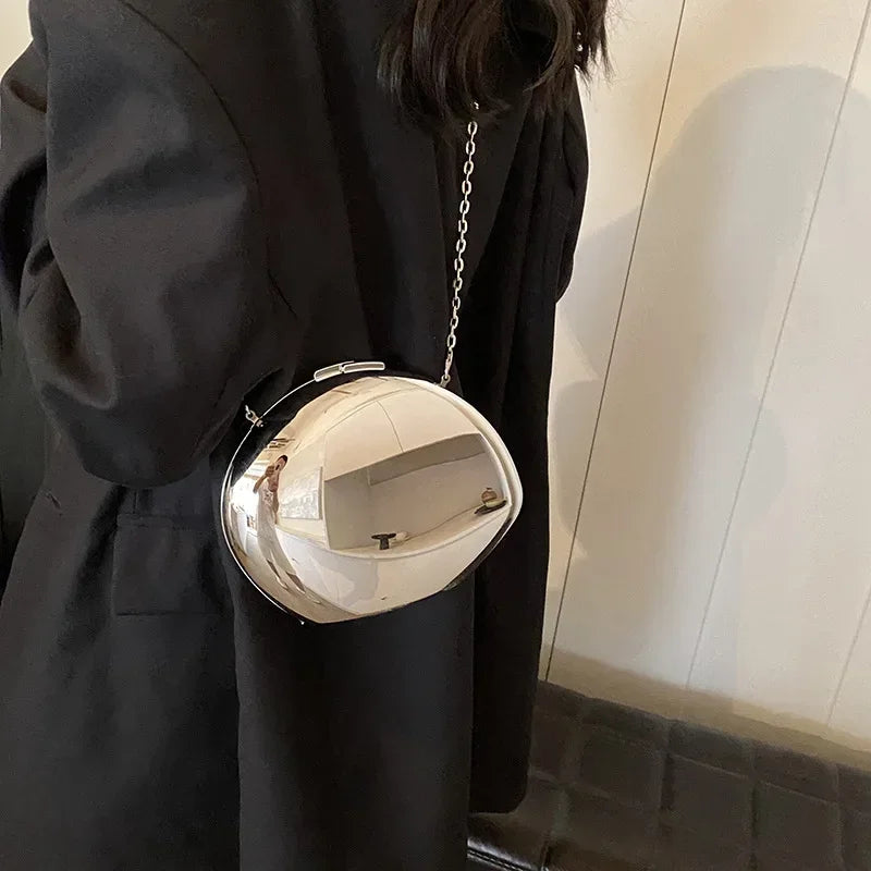 Stylish VaultHaus Acrylic Shell Shape Clutch Bag with a sleek shiny finish and chain strap