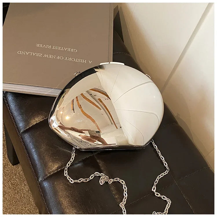 Stylish Acrylic Shell Shape Clutch Bag with Silver Chain, perfect for elegant occasions
