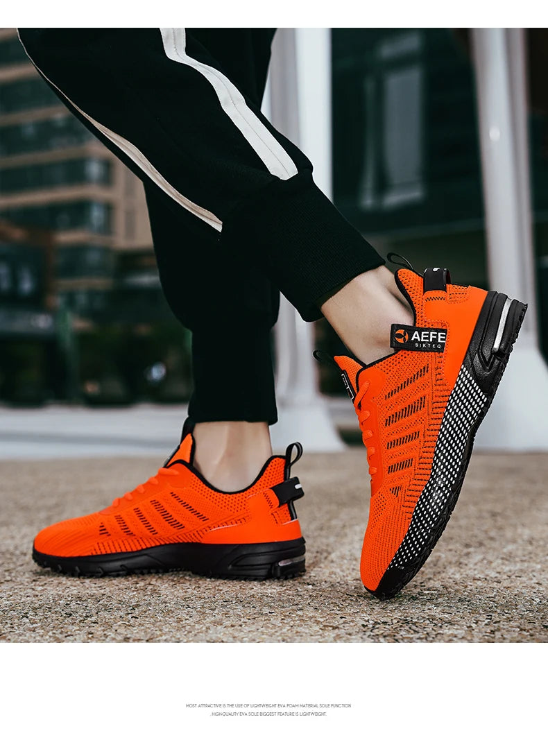 VaultHaus lightweight athletic sneakers for men in bright orange with black soles and breathable mesh design