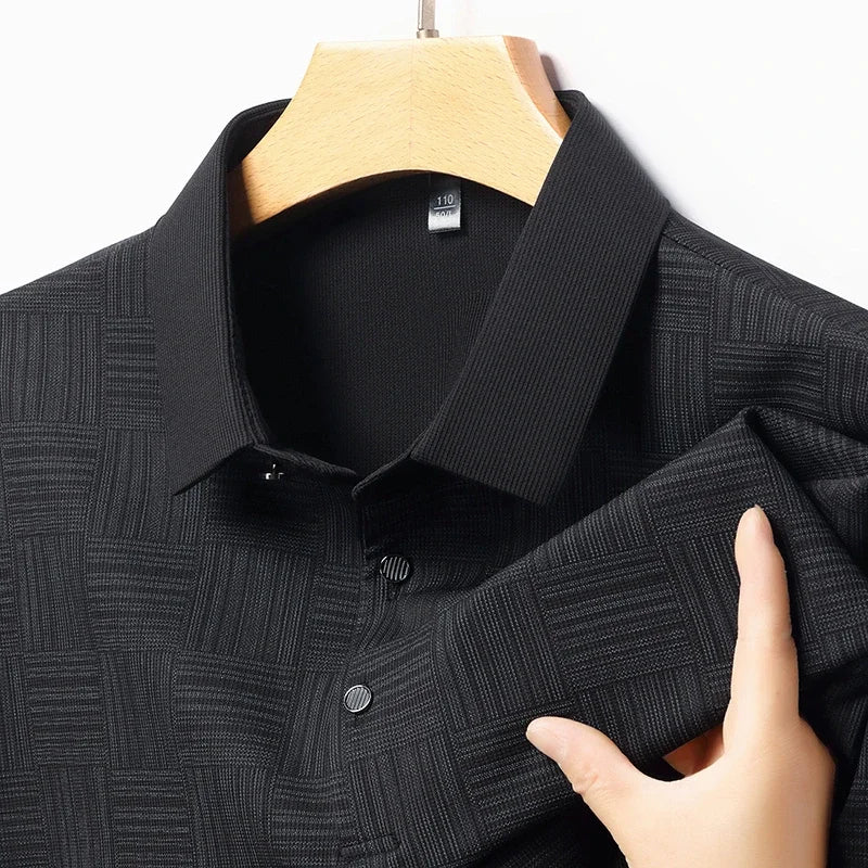 Stylish black business casual polo for men with textured fabric and button closure