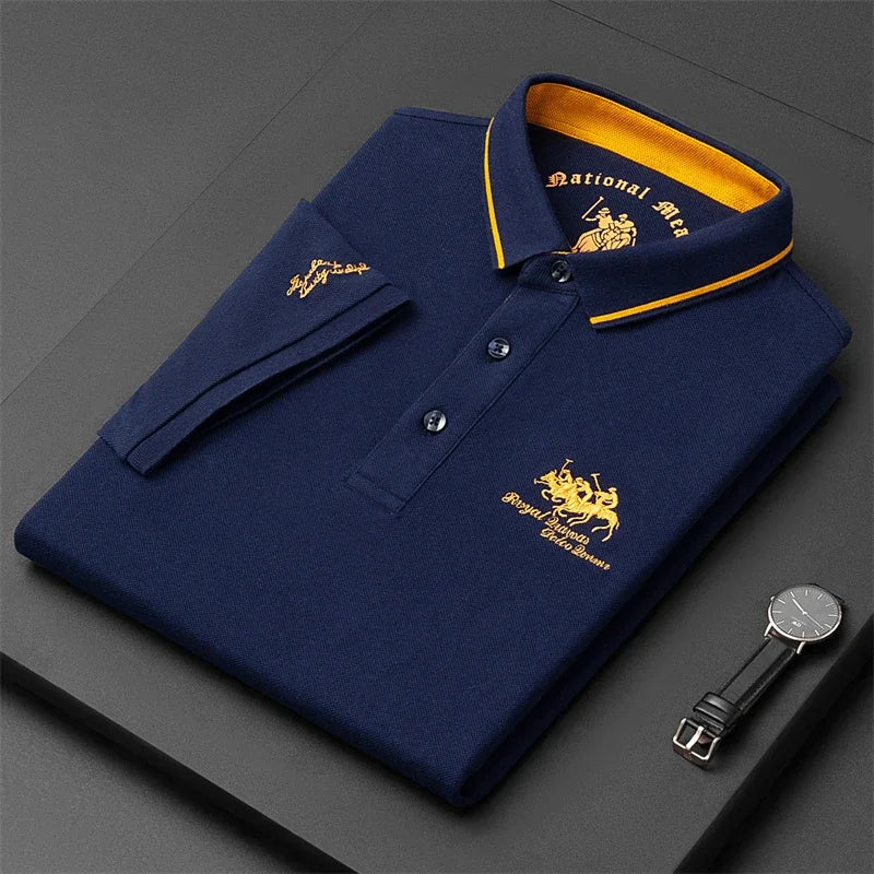 Navy blue VaultHaus comfortable men's polo top with yellow collar and logo detailing