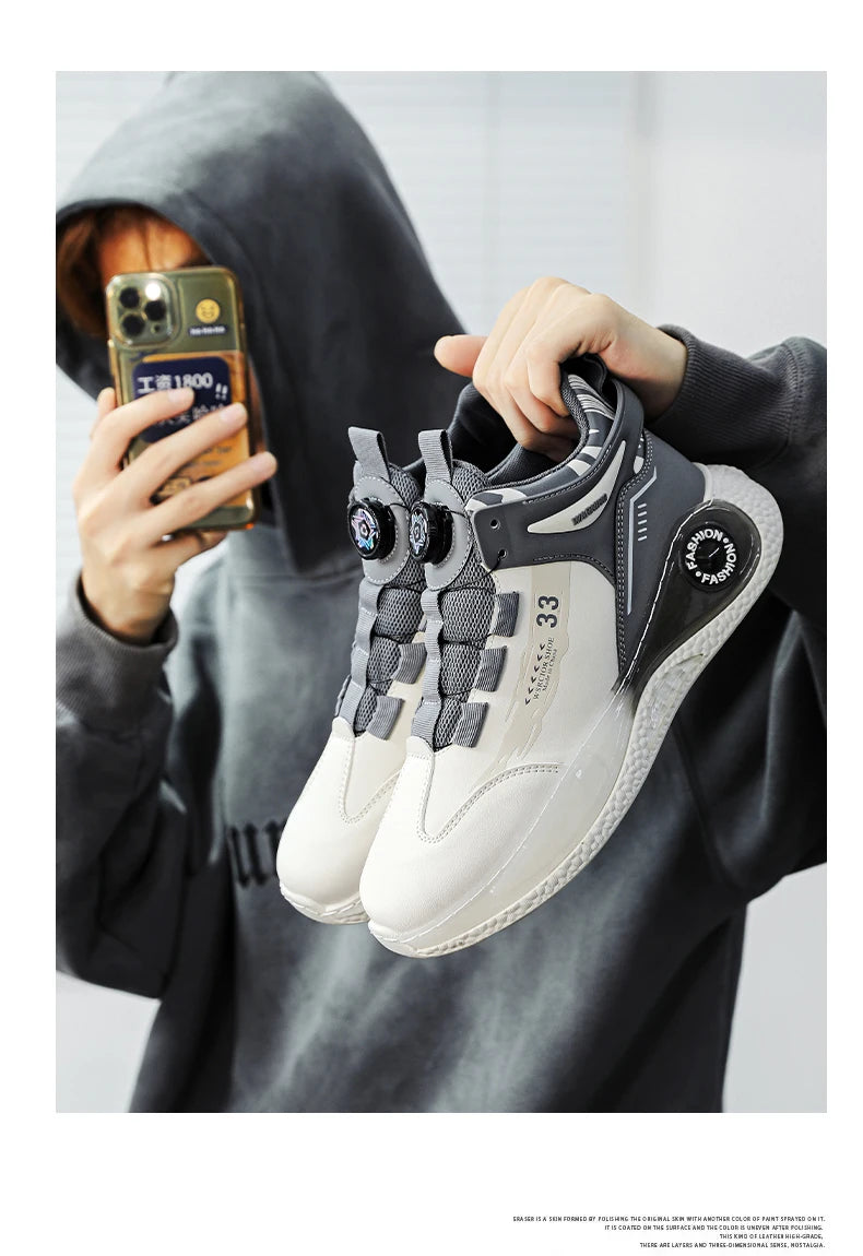 VaultHaus comfortable non slip lace up men's sneakers in white and gray held by person in hoodie