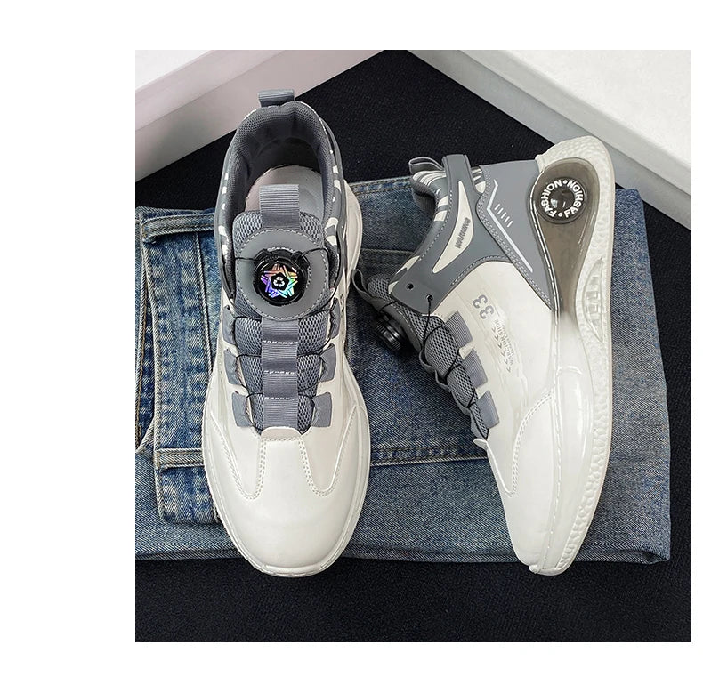 Comfortable non slip lace up men's sneakers in white and gray by VaultHaus on denim background