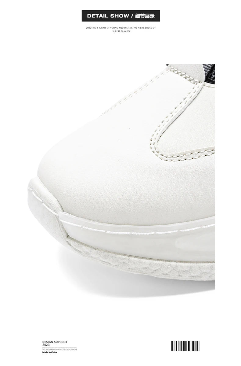 Close-up of VaultHaus comfortable non slip lace up men's sneakers in white showing detailed stitching
