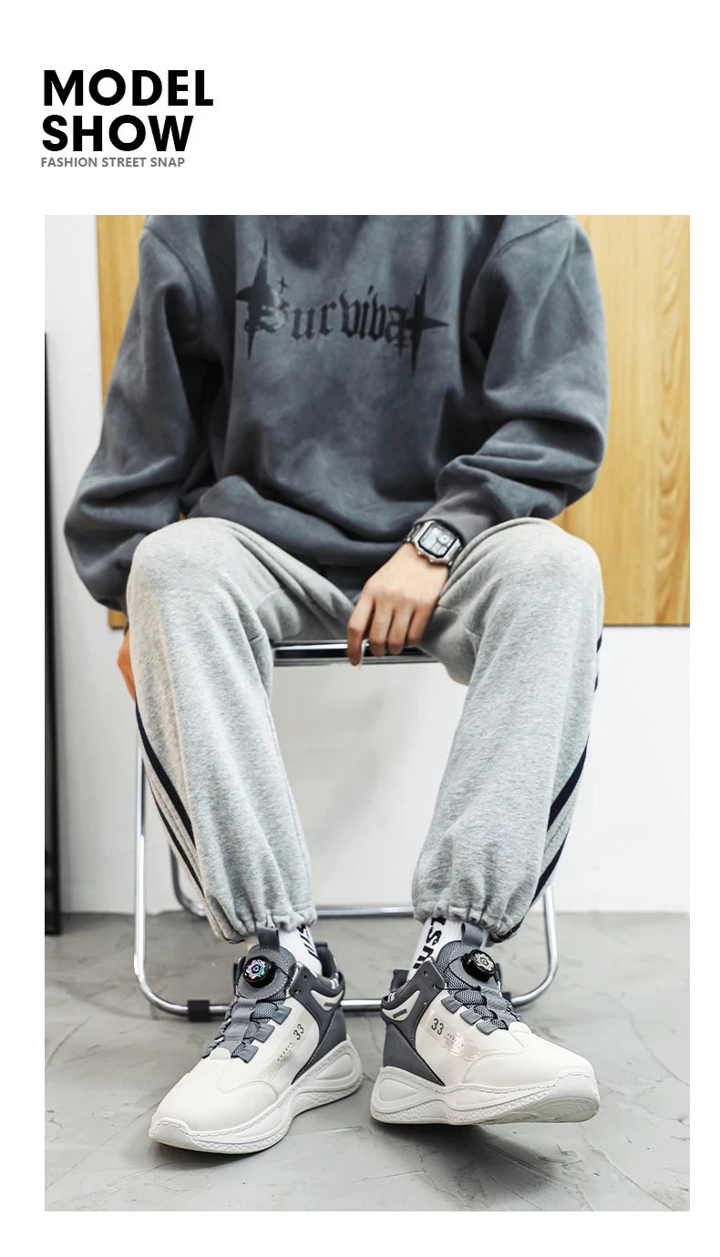 Comfortable non slip lace up men's sneakers by VaultHaus worn with gray joggers and sweatshirt