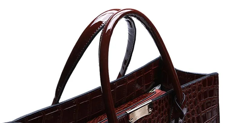 Stylish crocodile print tote bag in sleek brown with elegant handles for a fashionable look