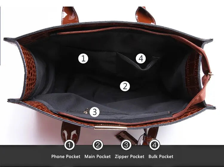Interior view of a crocodile print tote bag featuring multiple pockets for organization
