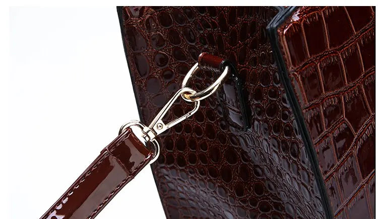 Close-up of the shiny detailing on a crocodile print tote bag by VaultHaus