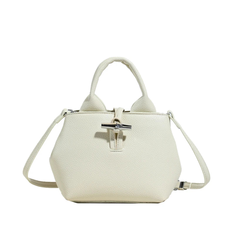 VaultHaus designer women's leather shoulder bag in white with adjustable strap and top handles