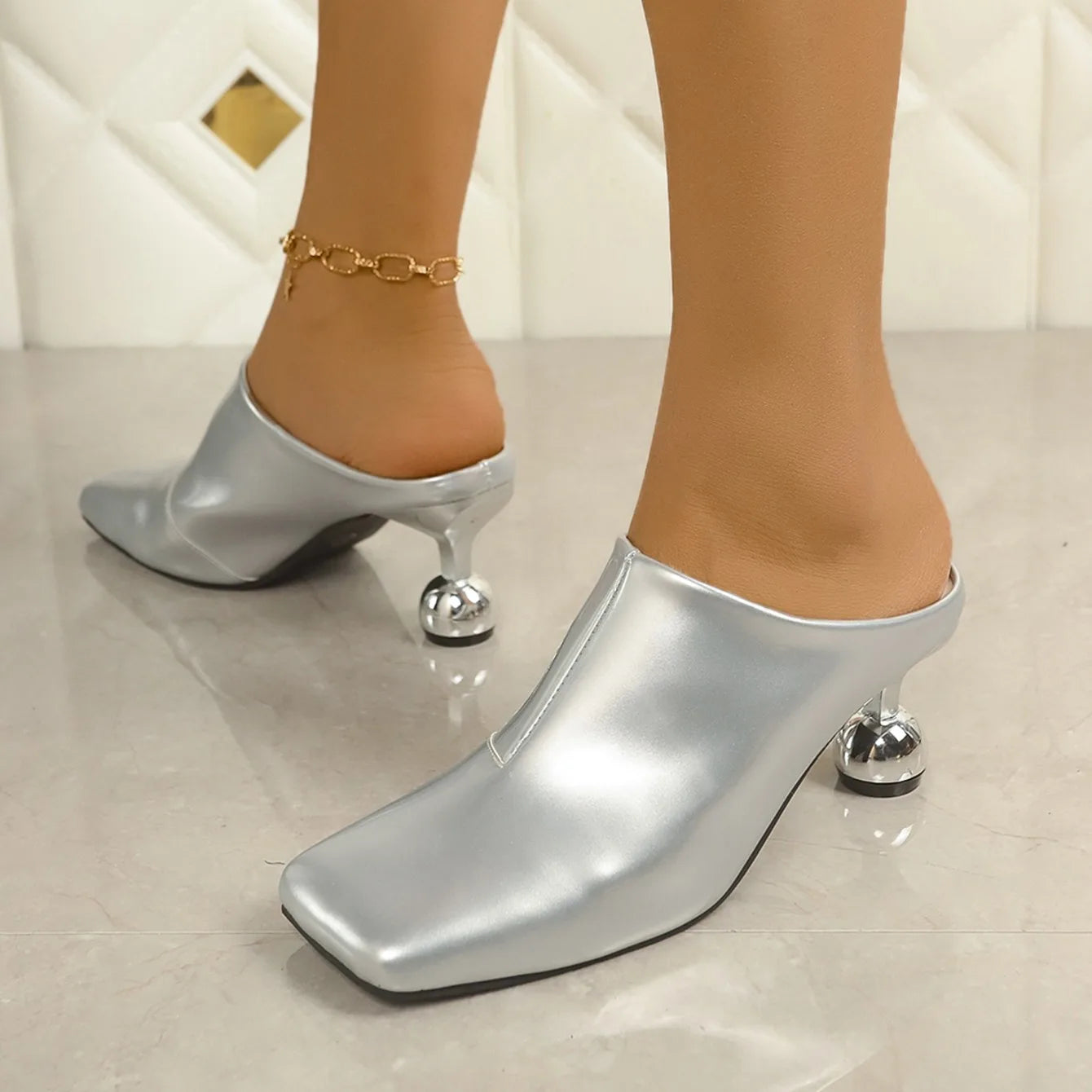 VaultHaus designer women's wedge sandals in metallic silver with unique round heels and slip-on style