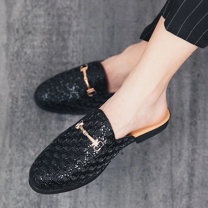 Black woven leather fashion mules for men by VaultHaus with gold buckle detail