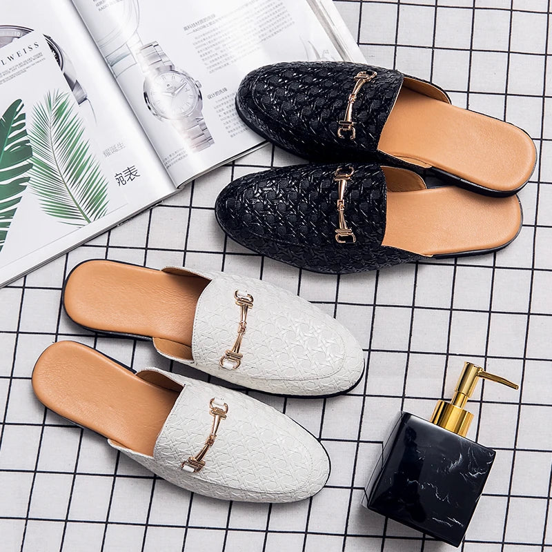VaultHaus black and white fashion mules for men with quilted design and metal buckle detail.