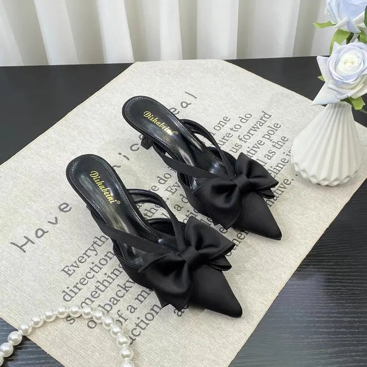 Elegant black shoes with bow, perfect for casual wear or special occasions, French style pink slippers available.