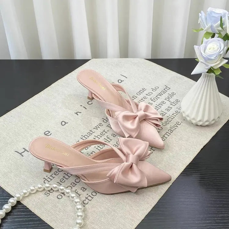 VaultHaus French style pink slippers with elegant bow detail and stylish heel for chic comfort