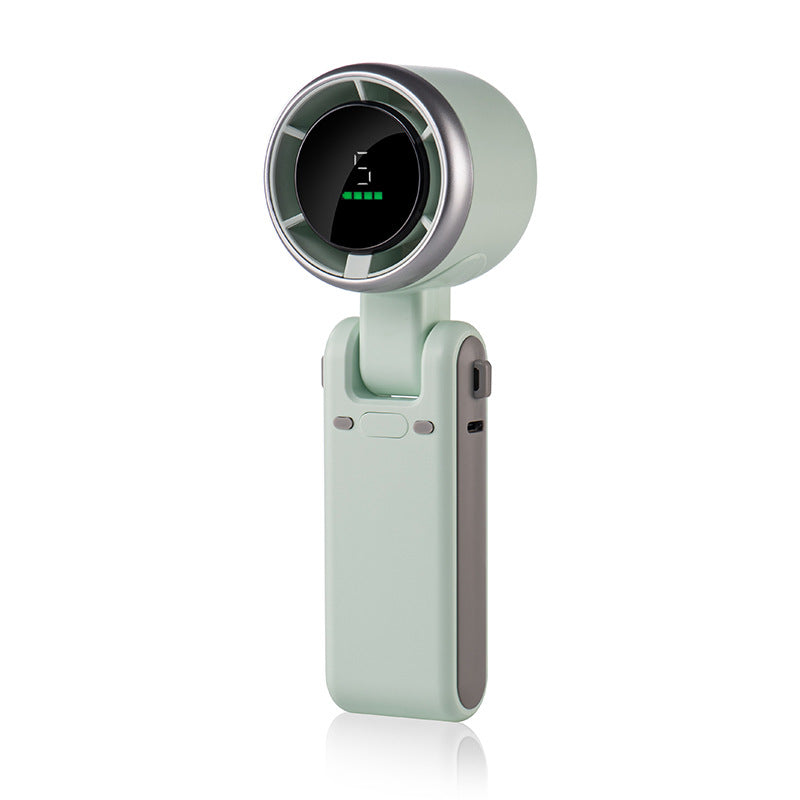 VaultHaus handheld turbo fan in mint green with digital display and compact portable design