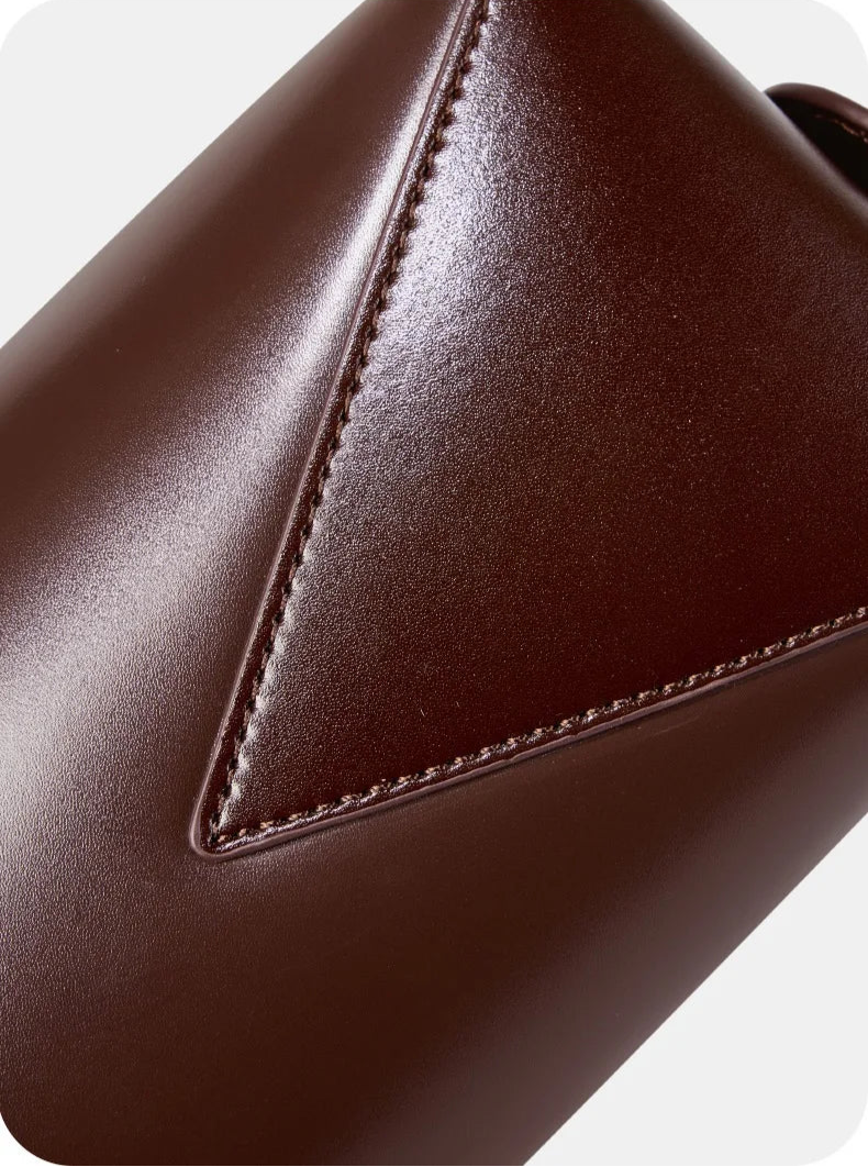 Stylish brown ladies baguette shoulder bag with a sleek design and versatile functionality