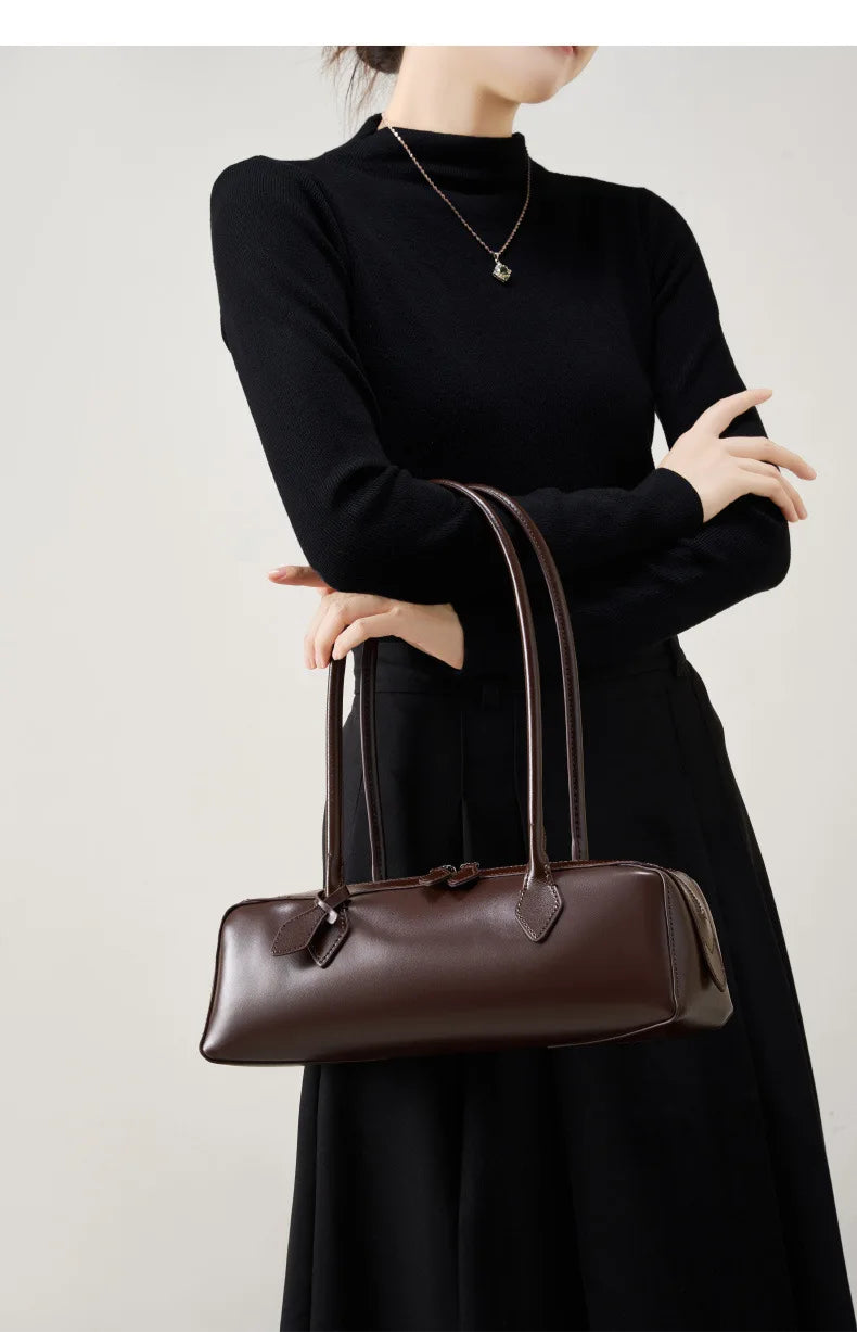 Stylish ladies baguette shoulder bag in dark brown, perfect for versatile outfits and everyday use