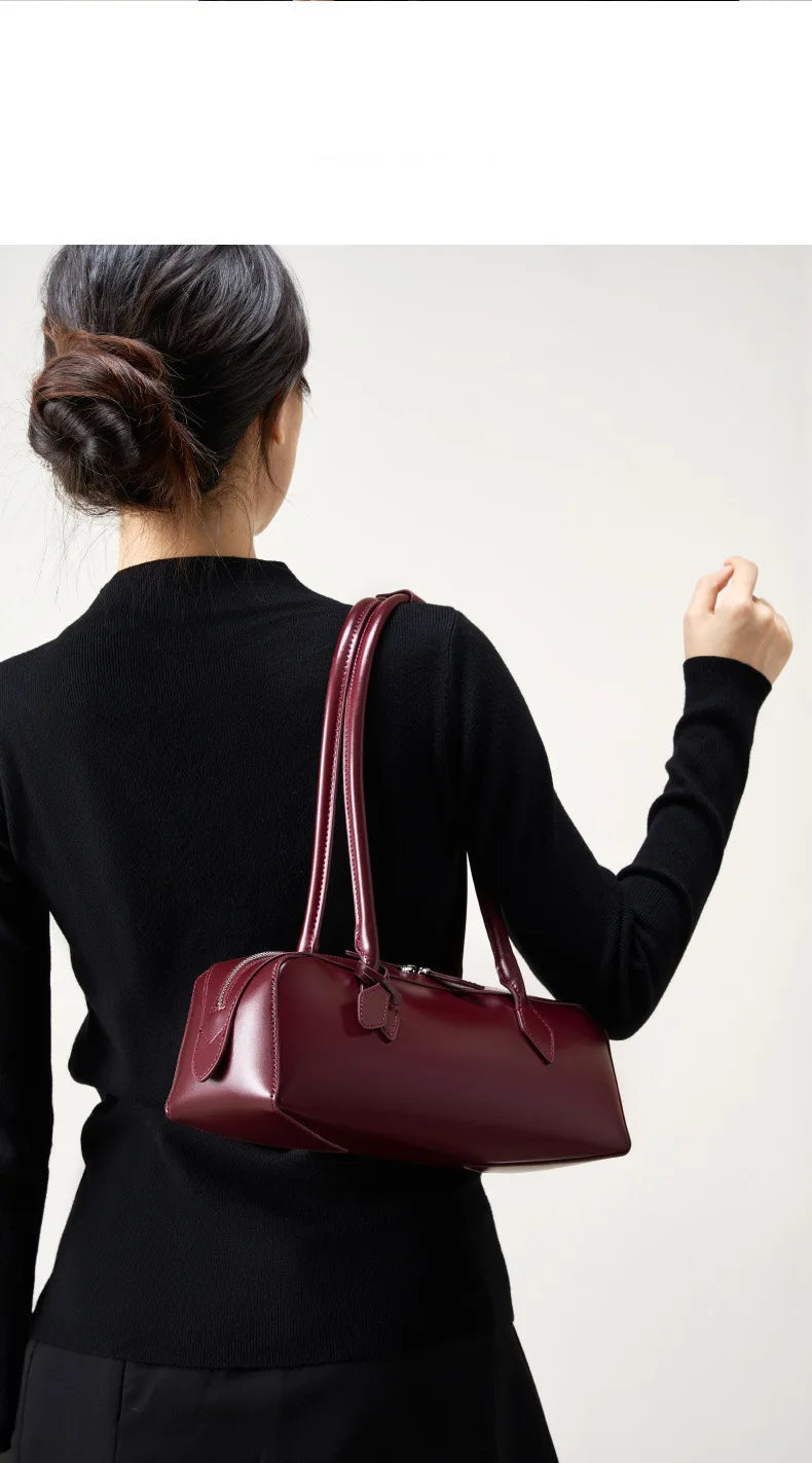 Stylish ladies baguette shoulder bag in burgundy, perfect for day or evening outings