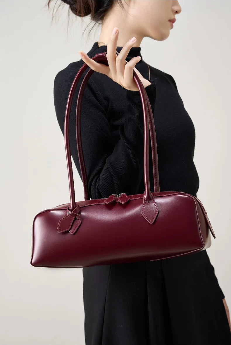 Elegant ladies baguette shoulder bag in burgundy with a classic diamond style for everyday use