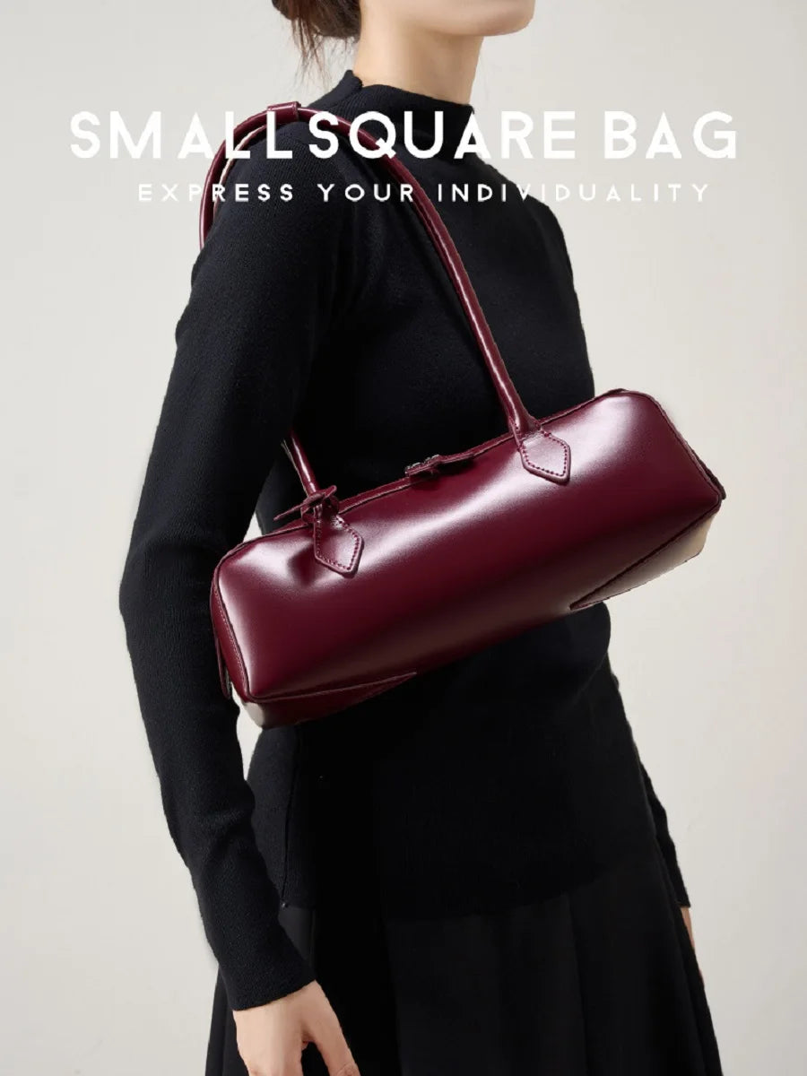 Stylish ladies baguette shoulder bag in burgundy for chic outfits and everyday use