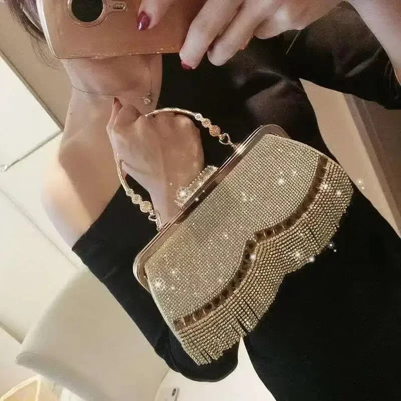 Elegant gold ladies luxury evening purse with fringe and decorative beads for special occasions