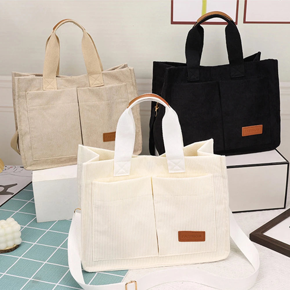 VaultHaus large capacity canvas handbag in beige, black, and cream with sturdy handles and front pockets