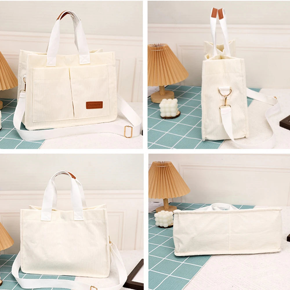 Stylish large capacity canvas handbag in cream color with versatile carrying options and spacious design
