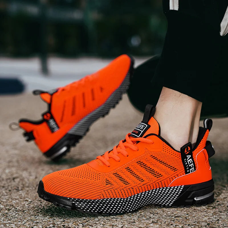 VaultHaus lightweight athletic sneakers for men in bright orange with black and white sole design
