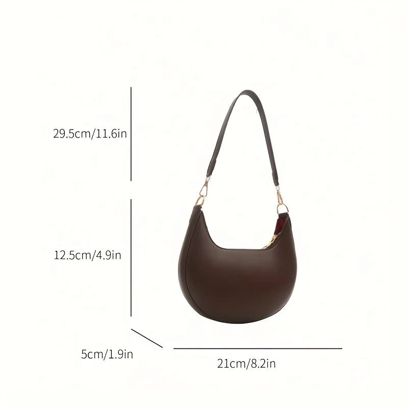 VaultHaus luxury moon-shaped handbag in brown with adjustable strap and spacious interior