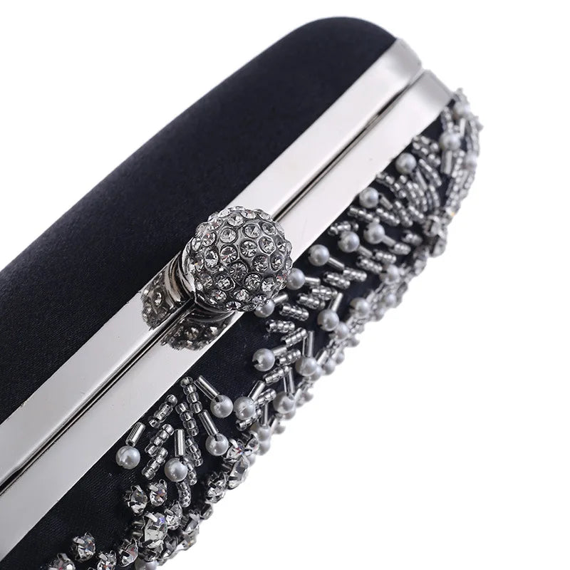 VaultHaus pearl embellished evening clutch bag with rhinestone clasp and detailed pearl and bead designs