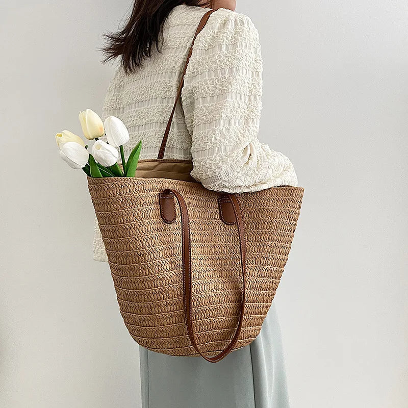 VaultHaus luxury woven shopper tote with delicate stitching and leather handles, ideal for carrying flowers