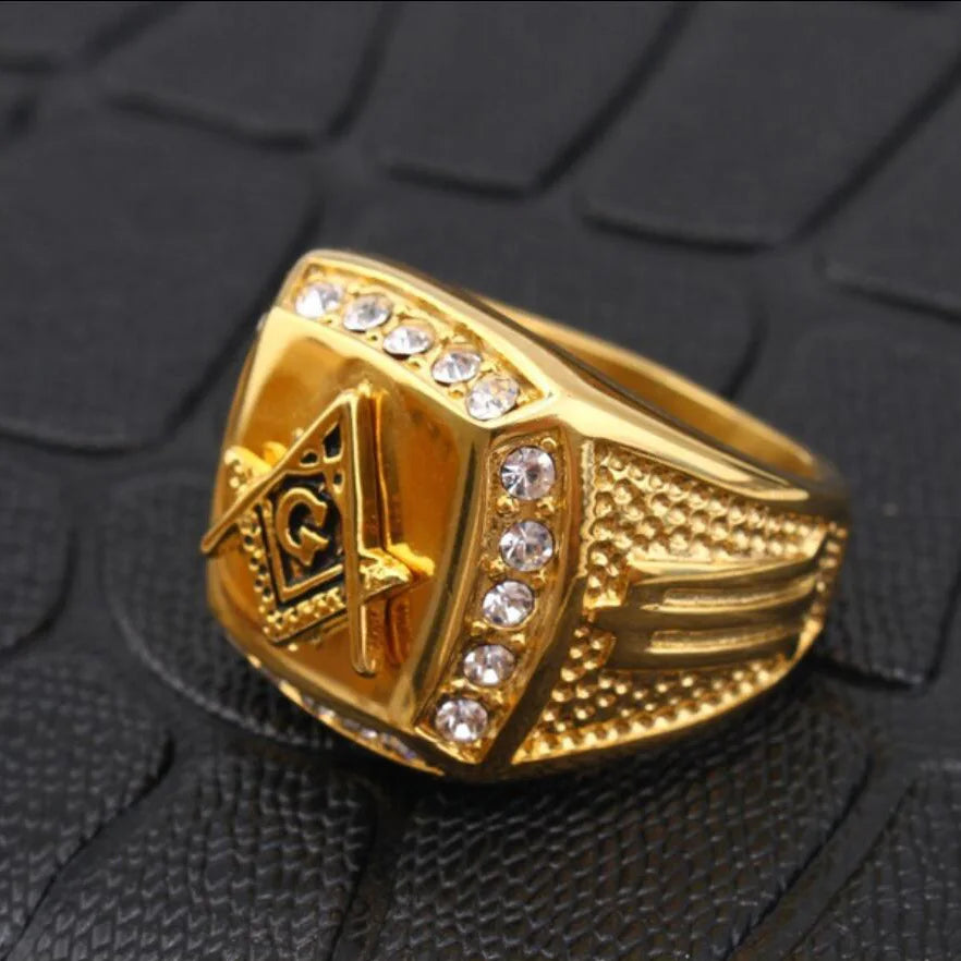 Iced out masonic ring for men featuring a gold finish and sparkling details