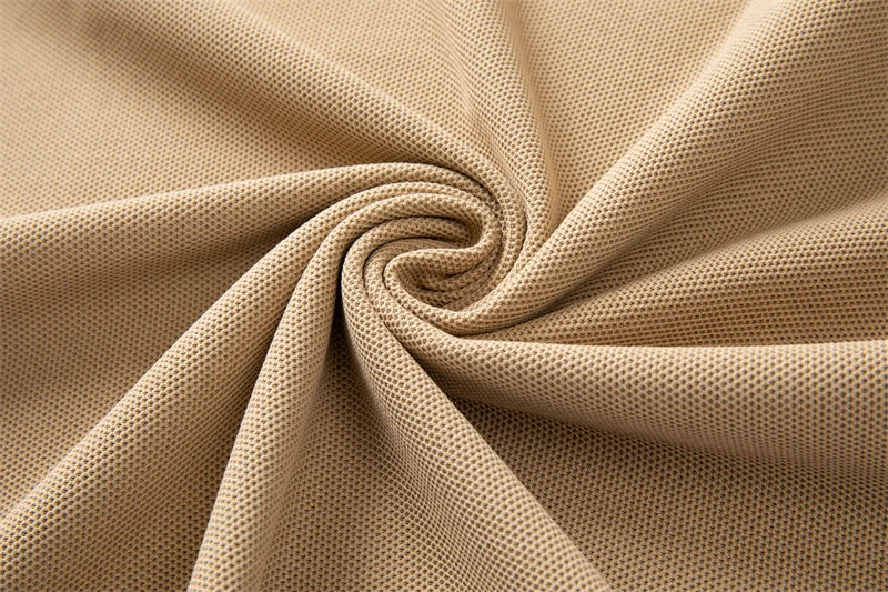 Soft beige fabric suitable for men's business casual polo shirt with a smooth texture