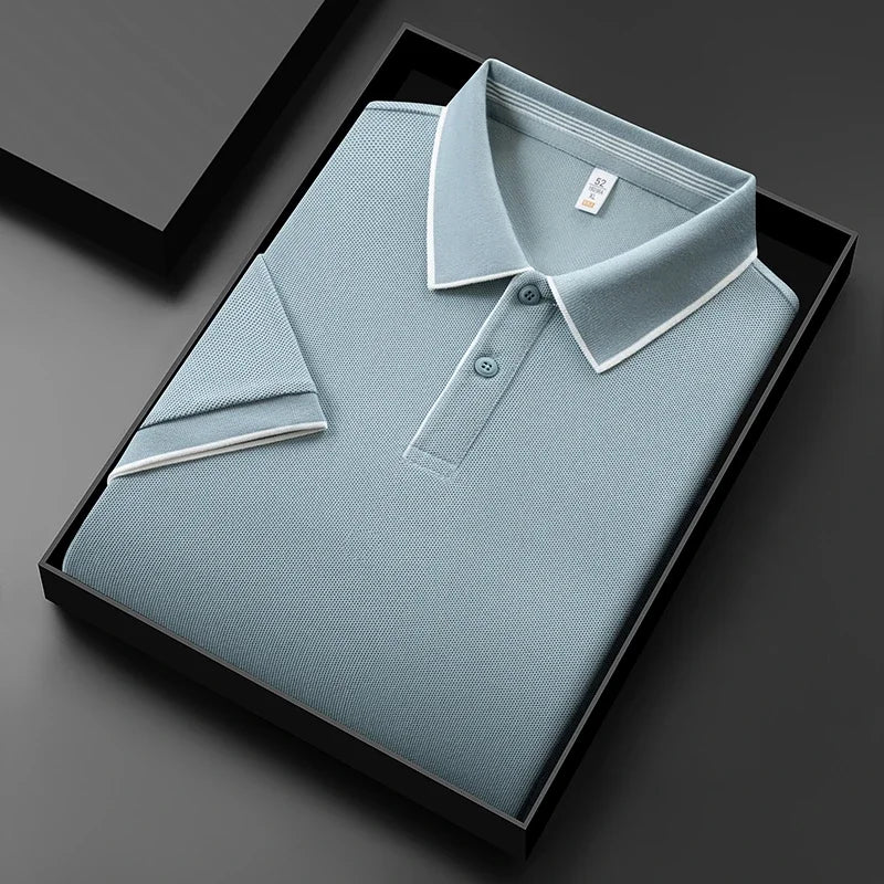Men's business casual polo shirt in light blue, neatly folded in a black gift box