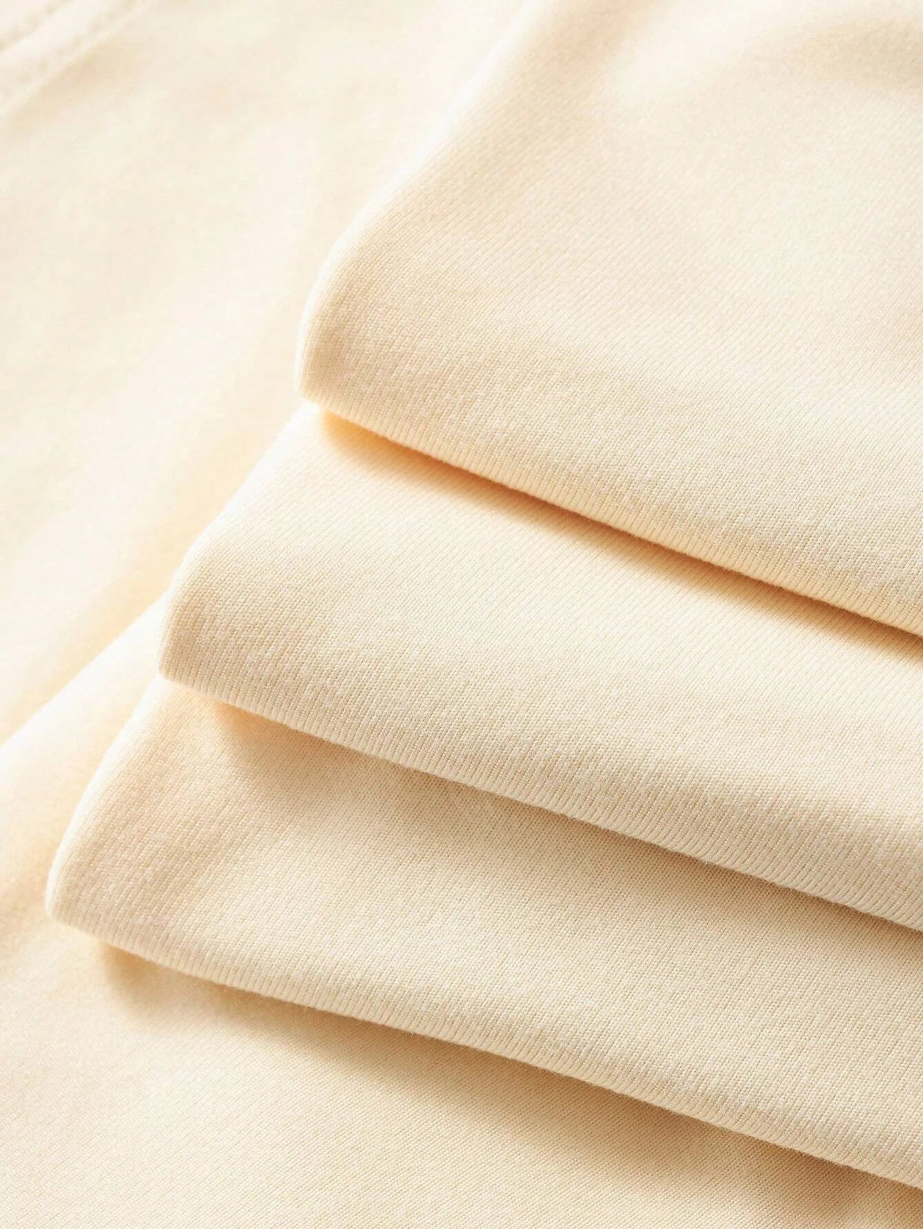 Close-up of soft fabric showcasing men's cotton summer graphic print bear t-shirt for comfortable wear