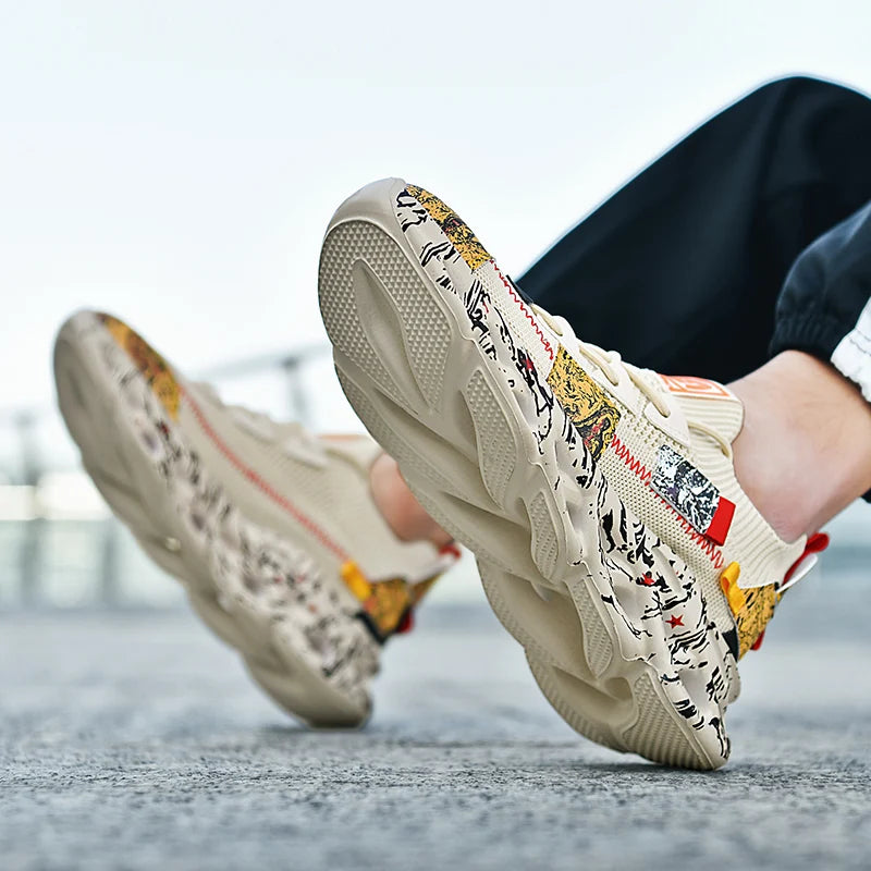 VaultHaus men's luxury sneakers in beige with artistic patterns and chunky sole on model's feet