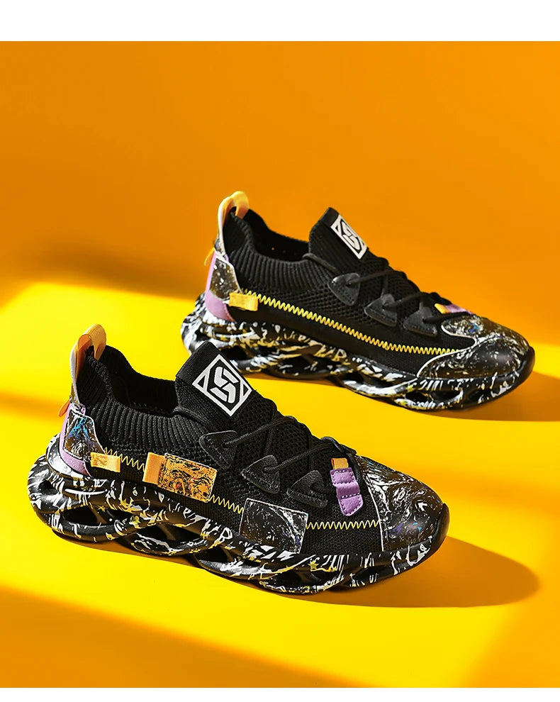 VaultHaus men's luxury sneakers in black with bold patterned soles and colorful accents