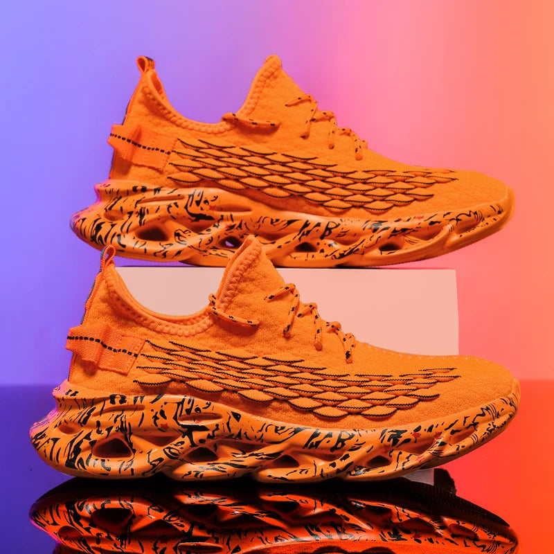 VaultHaus men's luxury sneakers in bright orange with unique black patterned sole and wing design