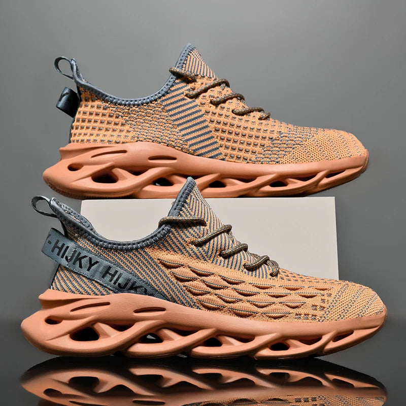 VaultHaus men's luxury sneakers with orange and gray breathable knit upper and unique hollow sole design