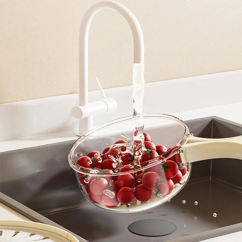 VaultHaus multi-function fruit and vegetable strainer basket rinsing fresh cherry tomatoes under kitchen faucet