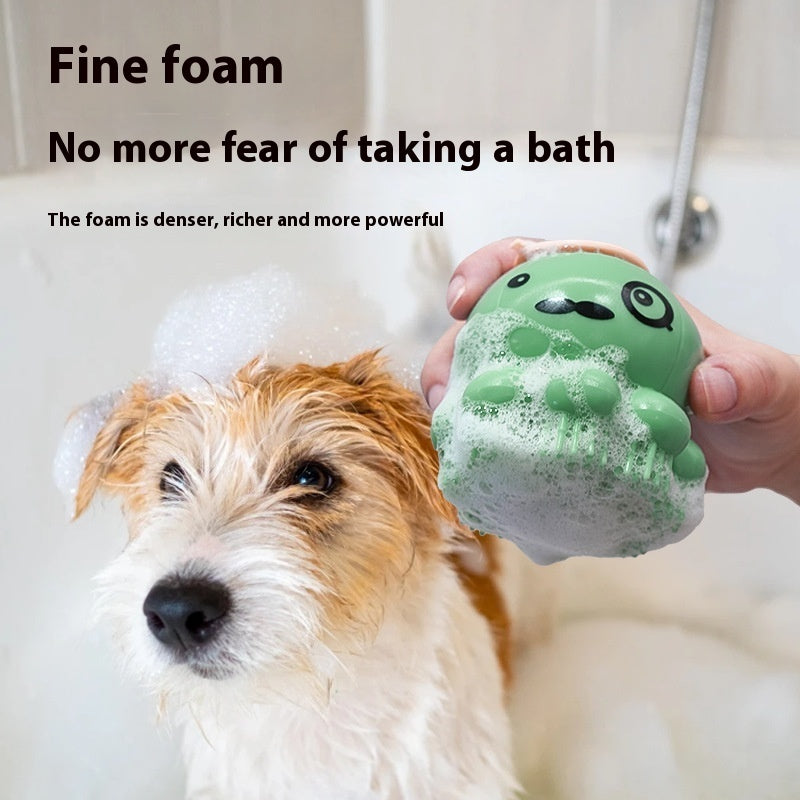 VaultHaus Dog Silicone Shower Brush green octopus scrubber creating rich foam on small white and brown dog in bathtub