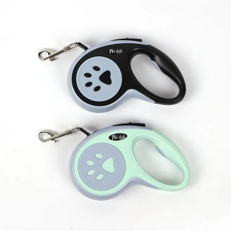 VaultHaus cat and dog retractable leash in black and mint colors with ergonomic handle for easy gripping