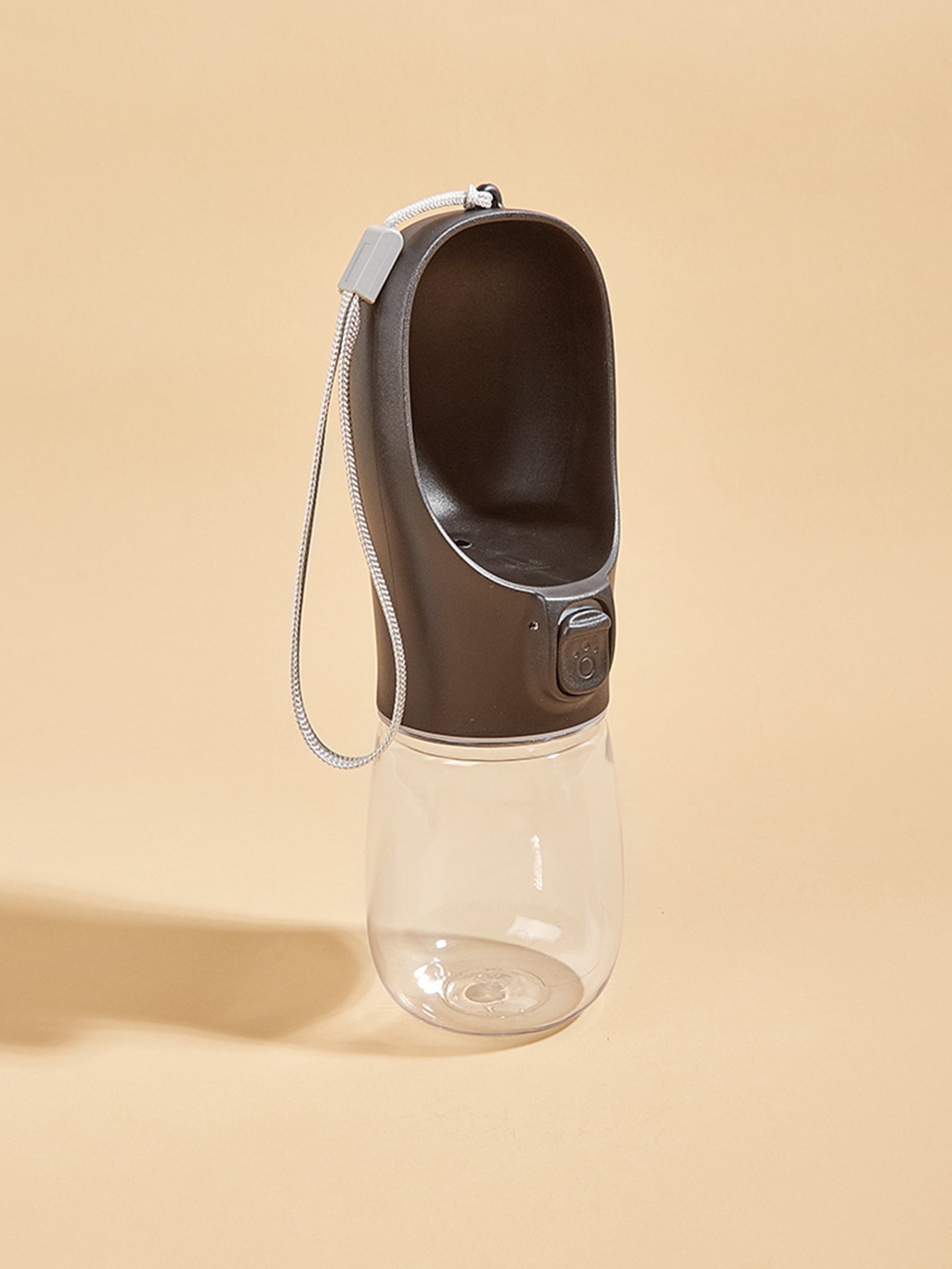 VaultHaus portable dog water bottle with black upper drinking tray and clear water reservoir