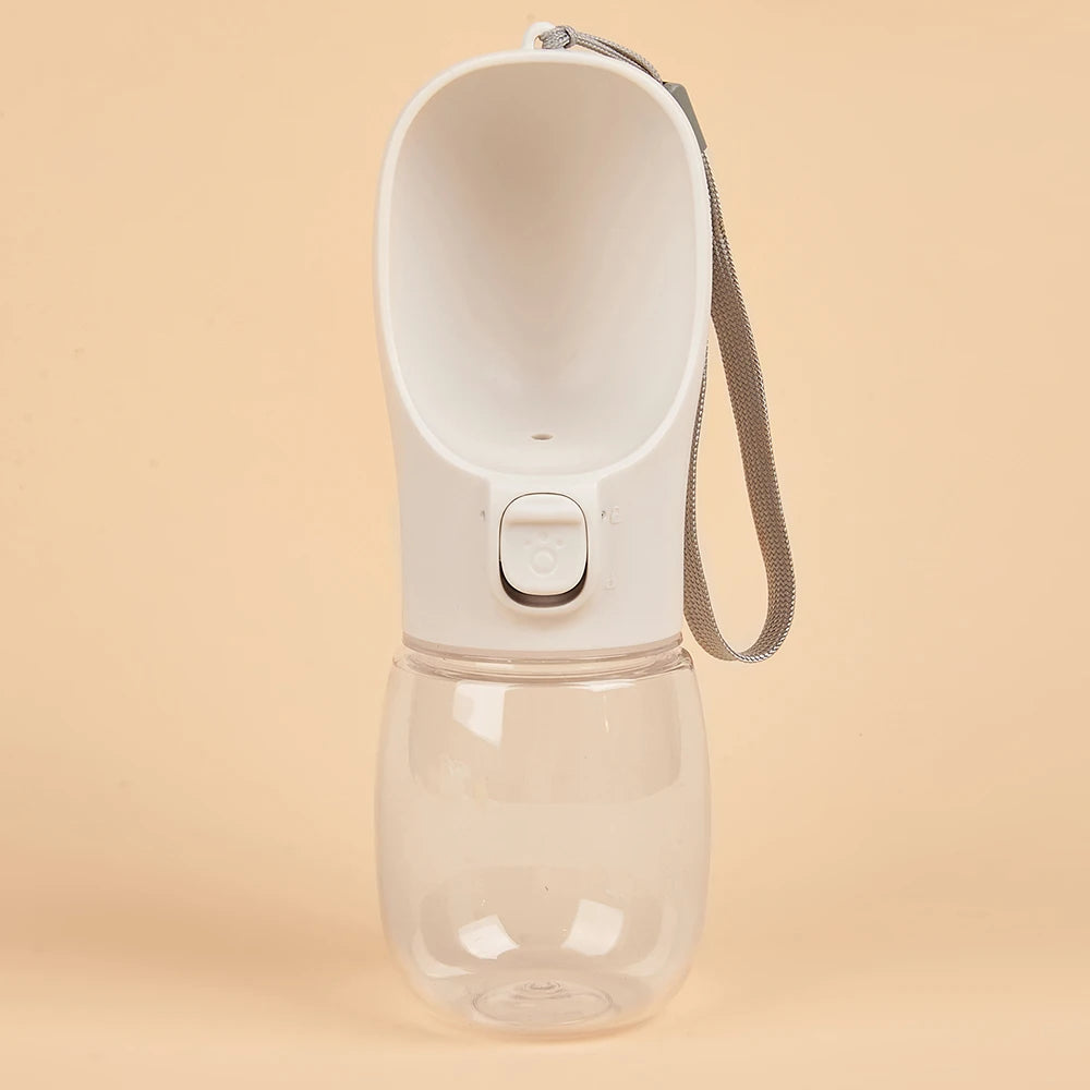 VaultHaus Portable Dog Water Bottle with attached drinking bowl and wrist strap for easy carrying