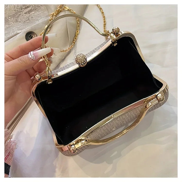 Interior view of a VaultHaus rhinestone evening bag showing the spacious black lining and elegant design