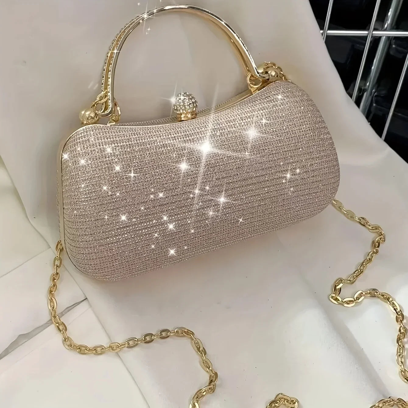 VaultHaus rhinestone evening bag in sparkling champagne color with elegant chain strap